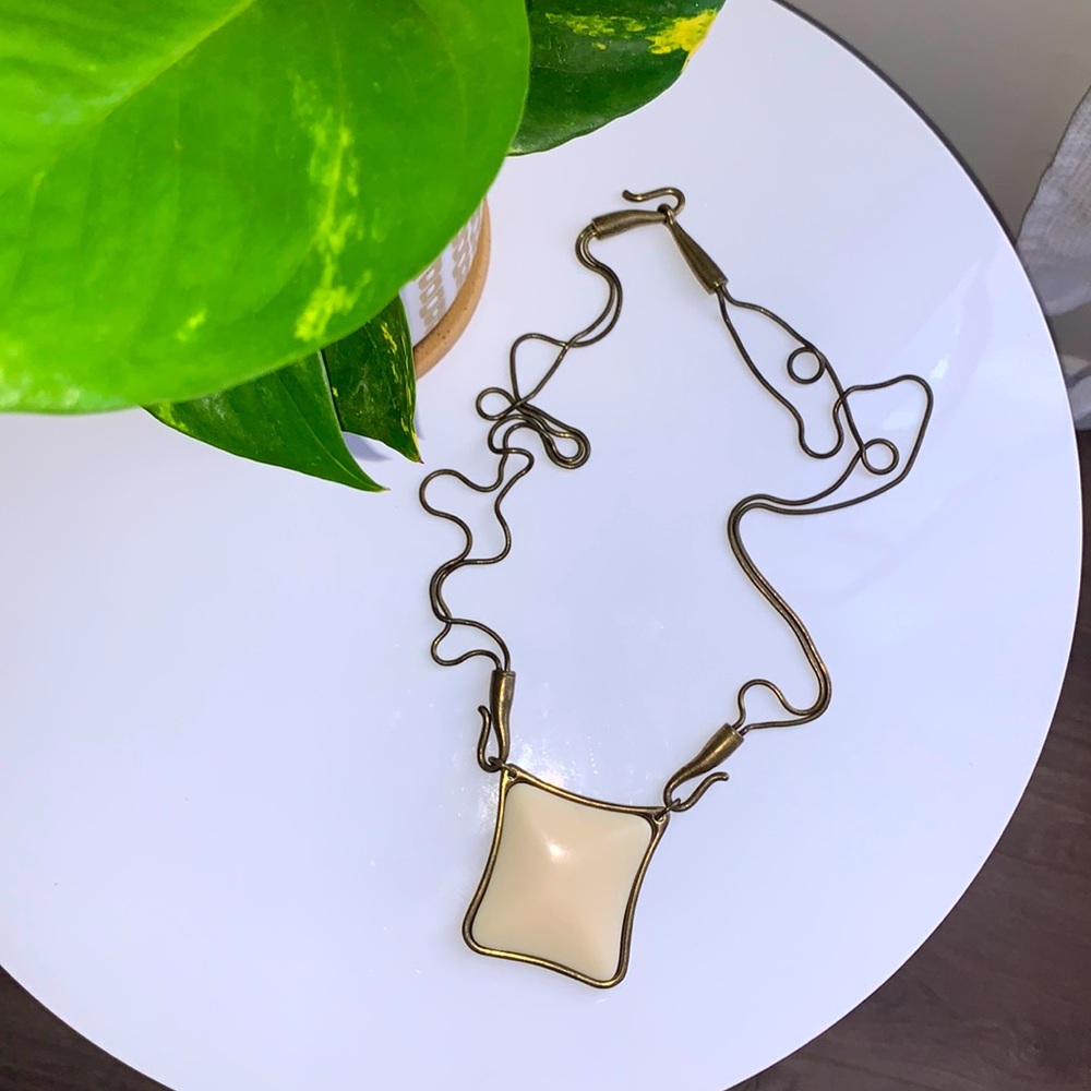Cream pendant necklace